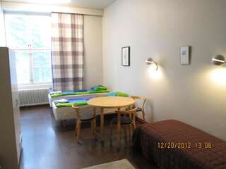 Хостелы Timitra Hostel Лиекса Двухместный номер с 2 отдельными кроватями и общей ванной комнатой-4